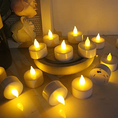 12 Pack Flameless LED Tea Light Candles Realistic Flickering Tealights BatteryPowered Candles Lights Holiday Gift for Wedding Party Home Valentines Decoration