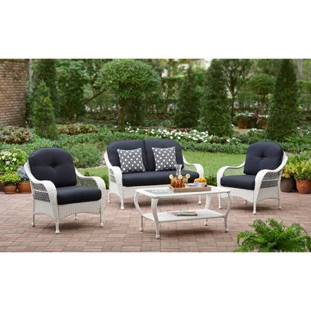 White All Weather Wicker 4 Piece Patio Conversation Set  Perfect Modern Cushioned Conversation Chairs and Loveseat with 2 Toss Pillows and a Glass Topped Coffee Table for Your Home Outdoors by the Grill Firepit Garden or Gazebo